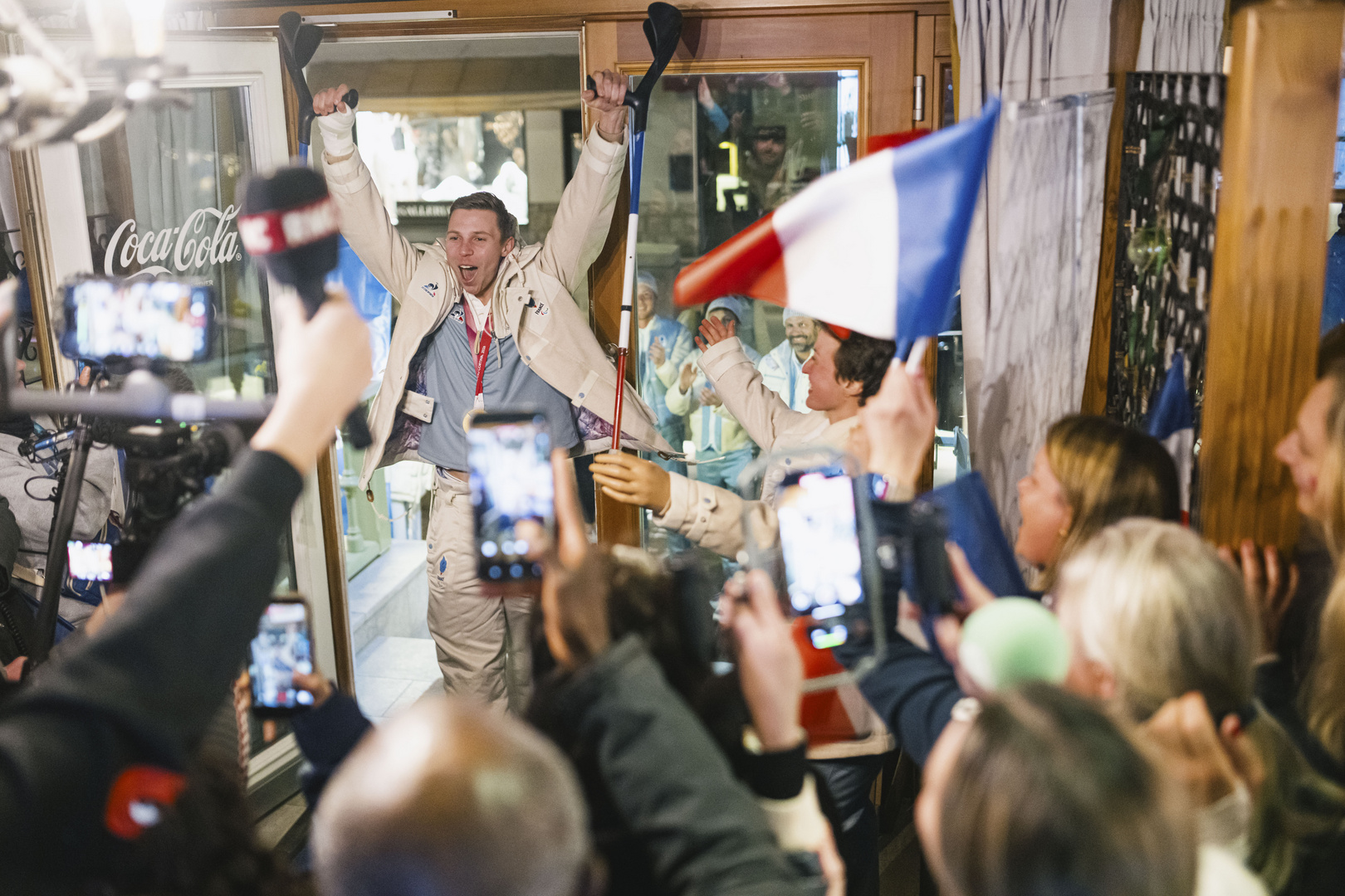 Team France celebrates at the Club France, during the XIV Winter Paralympic Games Milano-Cortina 2026, on March 10, 2026, 